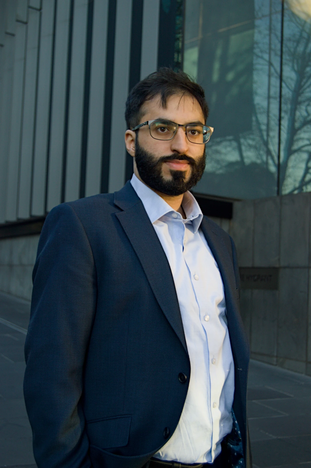 Umar Butler standing portrait